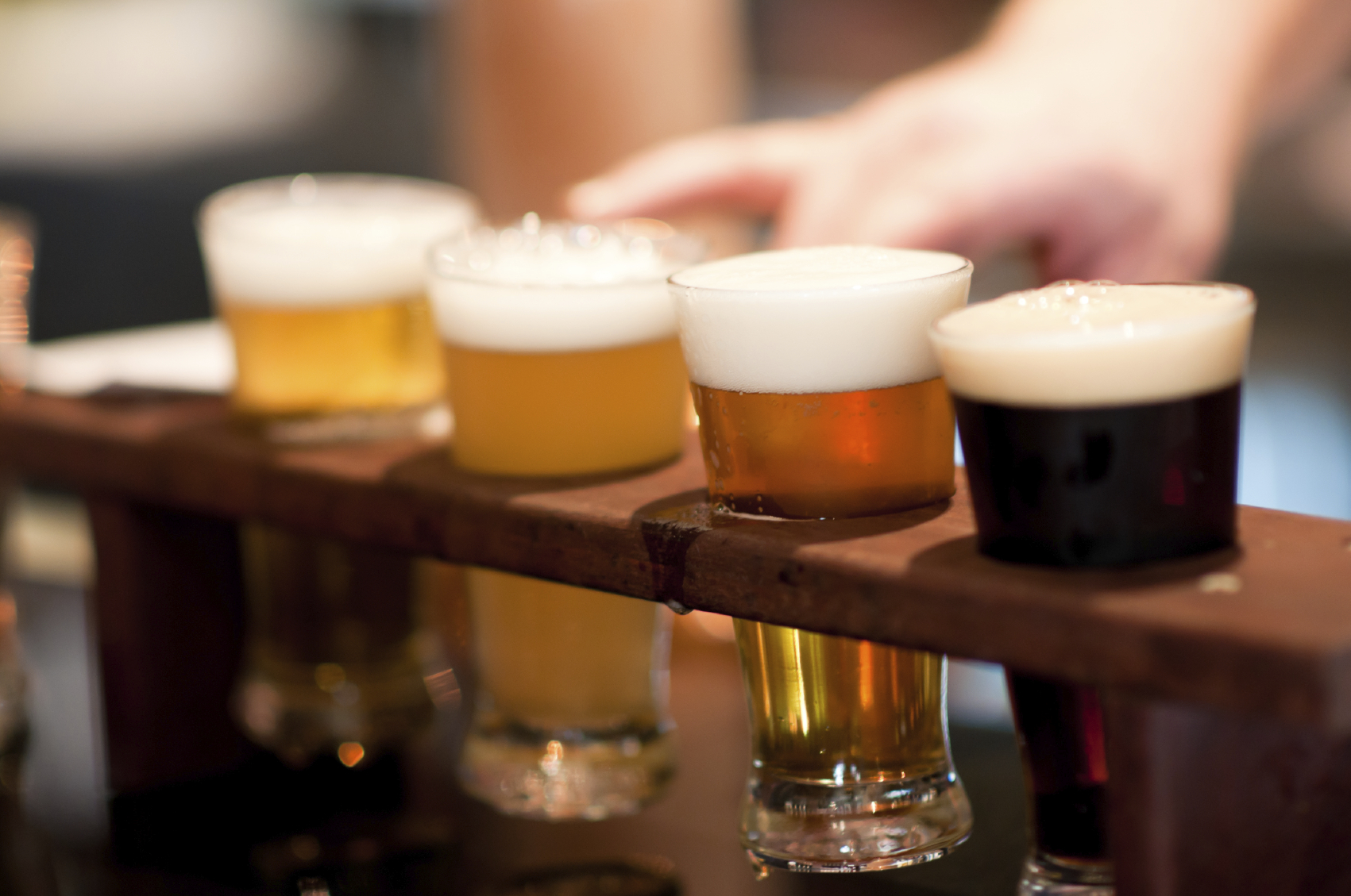 Research shows a compound in beer may save your brain from disease as you age.