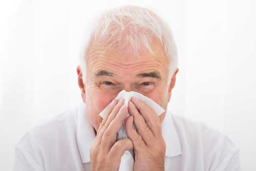 Man Sneezing