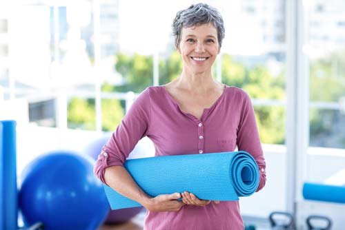 Mature lady doing yoga