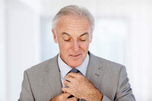 Man Fixing Tie