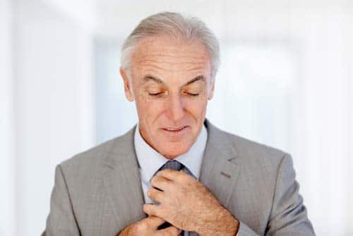 Man Fixing Tie