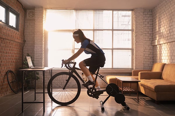 Image of woman on exercise bike