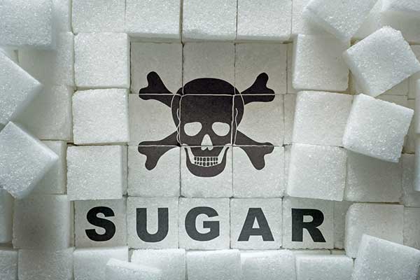 Death symbol with the word sugar underneath.