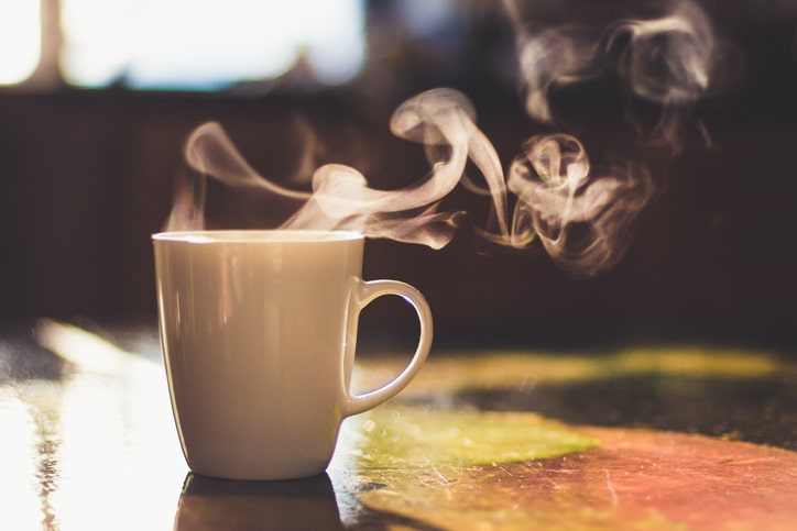 Photo of steaming cup of coffee